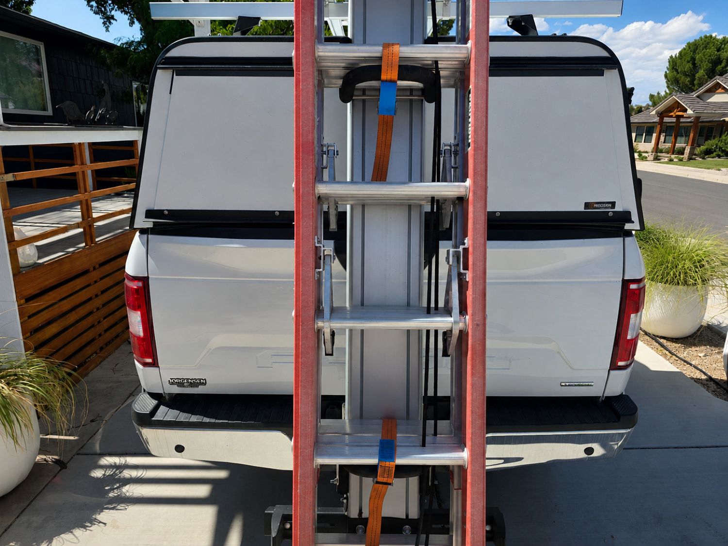 Load video: drop down ladder rack being loaded with 2 ladders