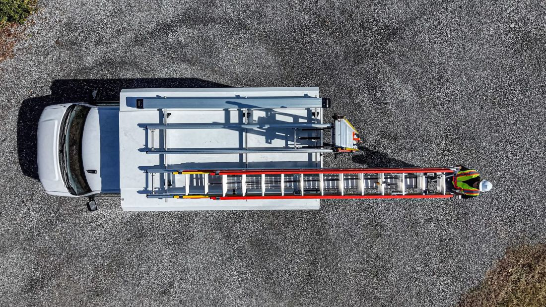 drop down ladder rack to worker on the ground