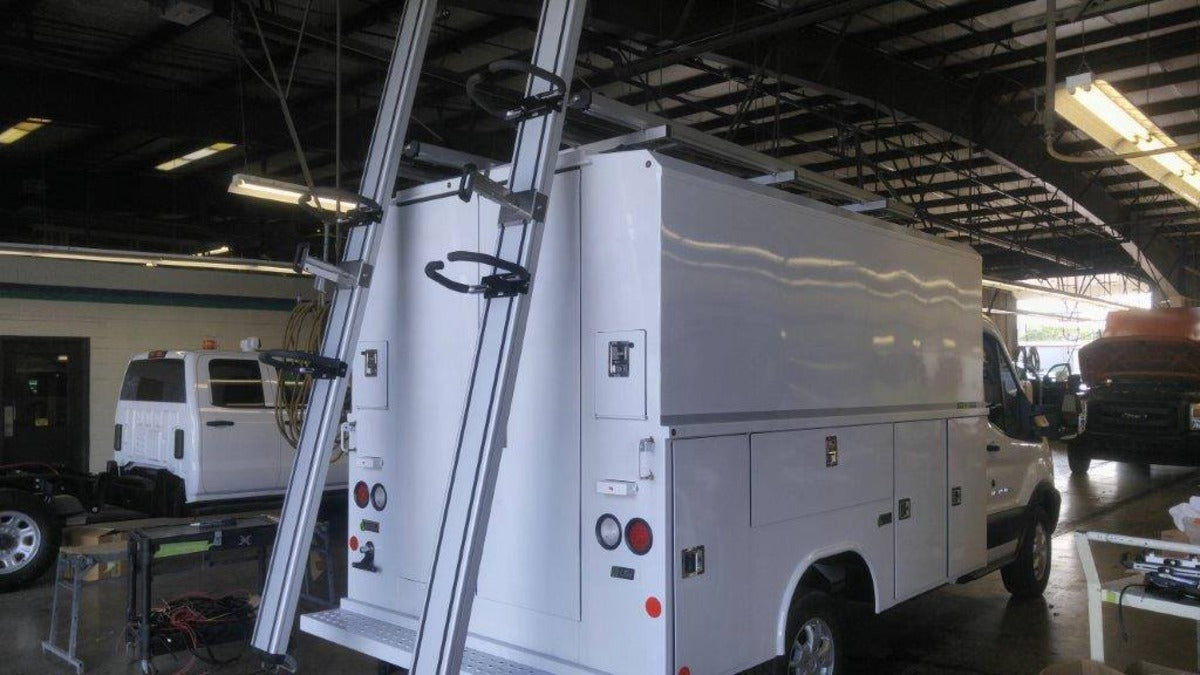 commercial fleet step van enclosed service knapheide body drop down ladder rack