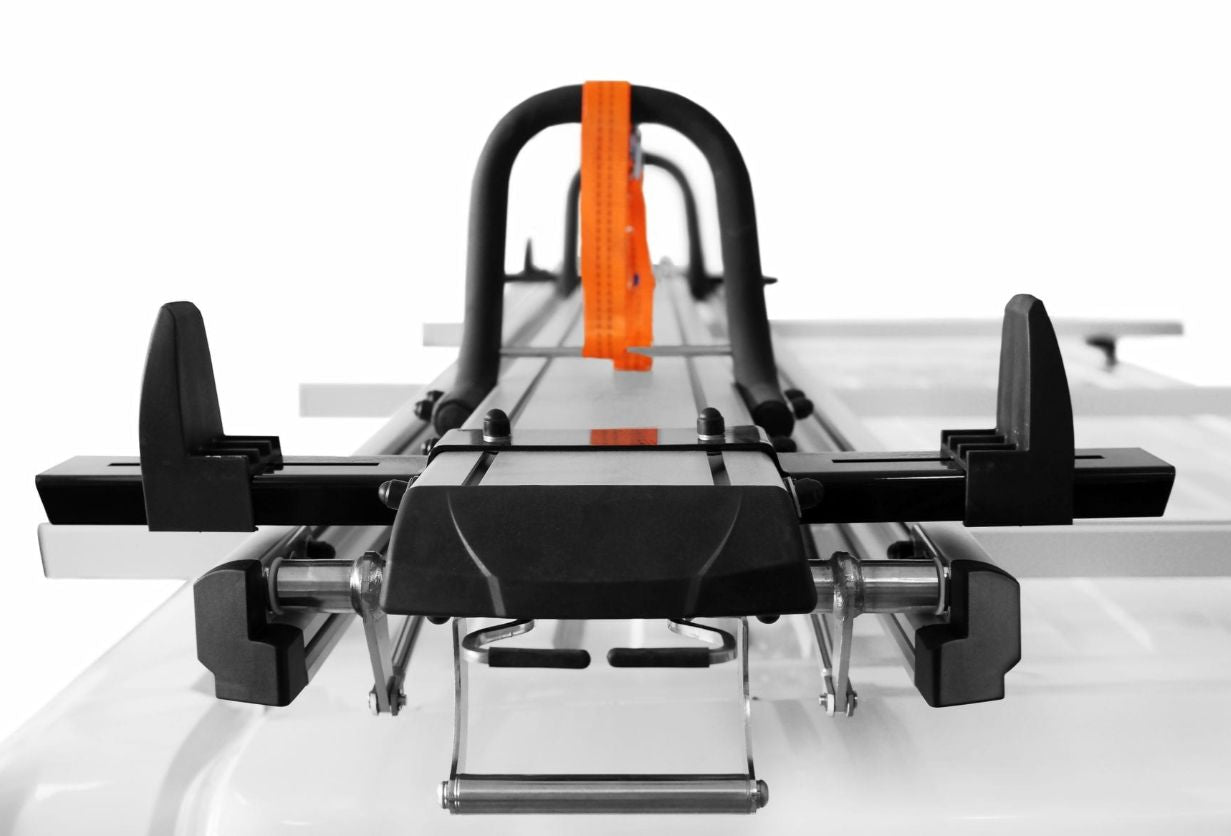 commercial white sprinter van with rear loading drop down ladder rack - close ladder retainer