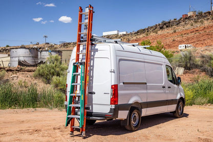 rear loading drop down ladder rack on dirt road