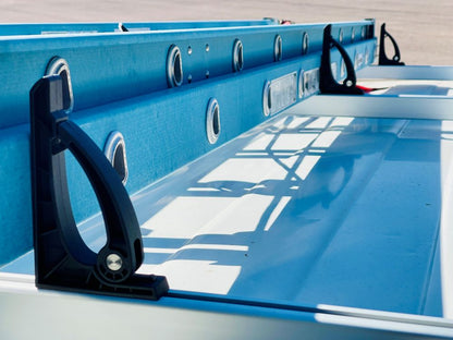 blue ladder on van roof rack